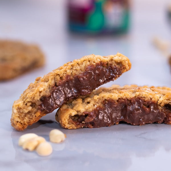 two oatmeal peanut butter chocolate cookies stacked